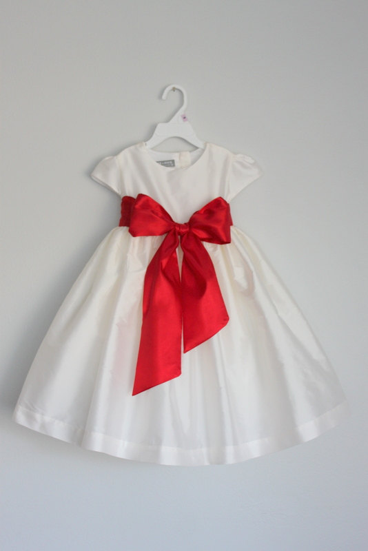 white frock with red flowers